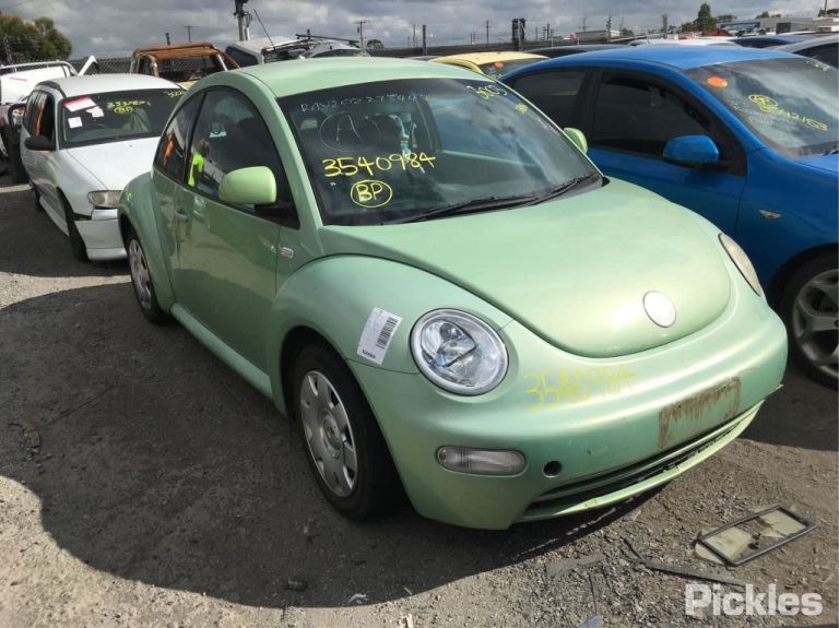 2001 VOLKSWAGEN BEETLE ON PLASTIC MODULE P/N 1C0907379C, ON MOTOR P/N 1J0614117E, 10/00-09/05 1J0614117E ABS PUMP MODULATOR