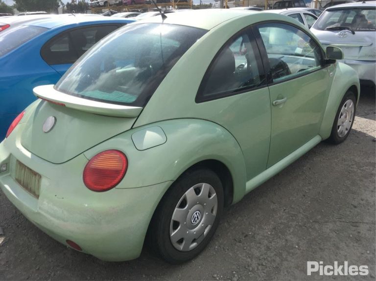 2001 VOLKSWAGEN BEETLE ON PLASTIC MODULE P/N 1C0907379C, ON MOTOR P/N 1J0614117E, 10/00-09/05 1J0614117E ABS PUMP MODULATOR