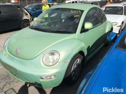 2001 VOLKSWAGEN BEETLE ON PLASTIC MODULE P/N 1C0907379C, ON MOTOR P/N 1J0614117E, 10/00-09/05 1J0614117E ABS PUMP MODULATOR